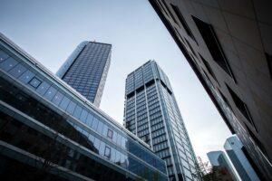 low-angle-shot-high-rise-buildings-clear-sky-frankfurt-germany-min (1)